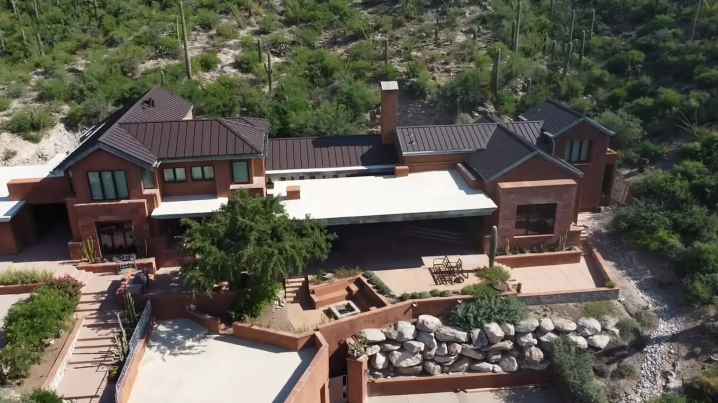 Trusted roofing contractors working on a residential roof in Tucson, AZ